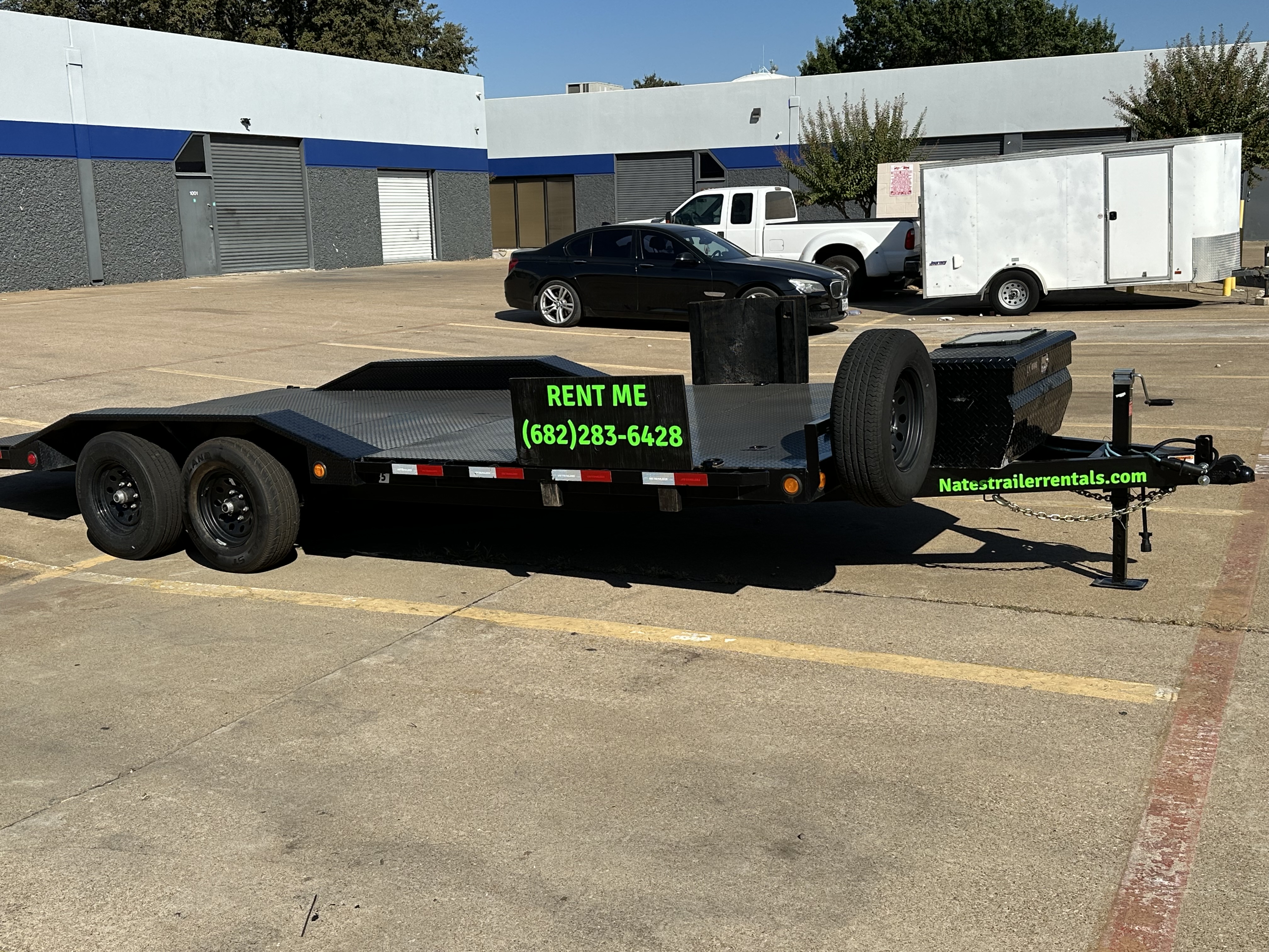 Side view of 2025 PJ Trailers B5 20ft steel deck car hauler flatbed trailer